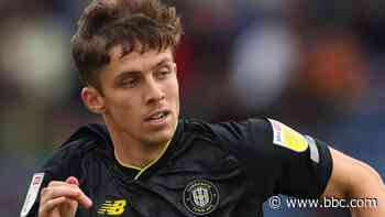 Luke Waterfall: Grimsby Town defender signs new two-year deal - BBC