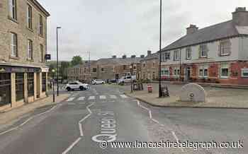 Dog bite man hit by fellow owner near Darwen