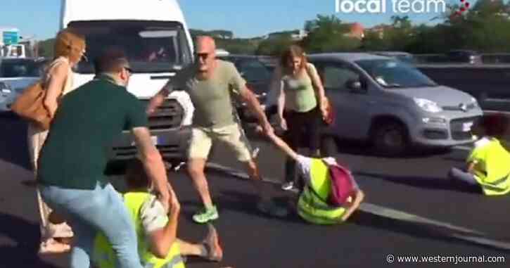 Video: Frustrated Drivers Blocked on Busy Road Take Matters Into Their Own Hands and Drag Protesters Out of the Way