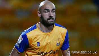 Farrend Rawson: Morecambe sign Mansfield Town defender on two-year contract