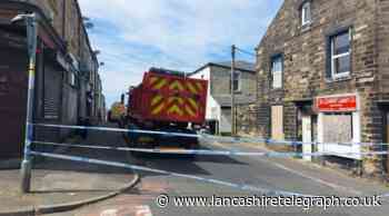 Burnley: House collapses after explosion, fire service say