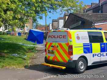 Investigation after 'dead body' found on Blackburn side street
