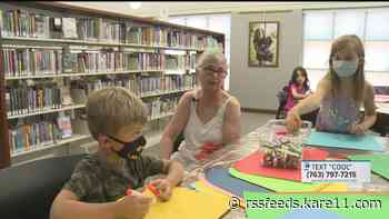 Kids spend 100-degree holiday at cooling centers like Washburn Library
