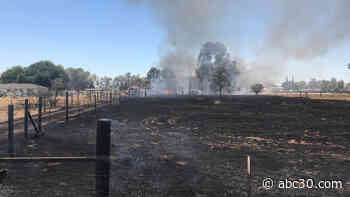 Crews battling fire in Fresno County that burned vacant home, multiple cars