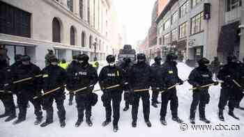 Watchdog clears Vancouver officers' use of 'less-lethal' rounds during Ottawa convoy - CBC.ca