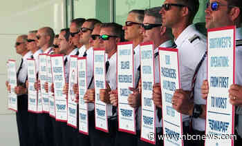 More than 1,300 Southwest Airlines pilots march on picket line, say they're overworked and underpaid