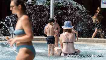 Heißes Sommerwetter in Deutschland - aber auch Unwettergefahr