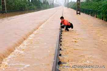 South China floods force tens of thousands to evacuate - St Helens Star