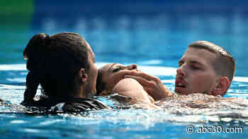US coach makes dramatic rescue of artistic swimmer at world championships