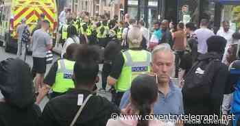 Man detained in packed Coventry street after alleged assault of two police officers - Coventry Live