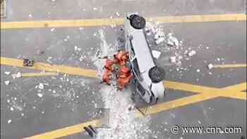 Two killed as Nio electric car crashes from third floor of a Shanghai building