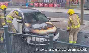Loud bangs heard following car fire close to Blackburn railway station