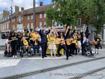 Why are there yellow pianos in Watford town centre?