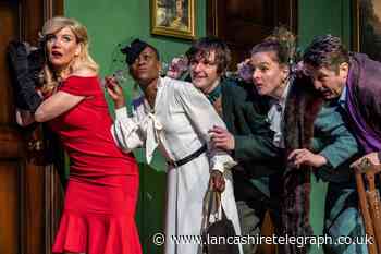 Michelle Collins vamps it up as Miss Scarlett in Cluedo