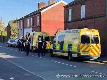 Police swarm around St Helens street as searches take place - St Helens Star