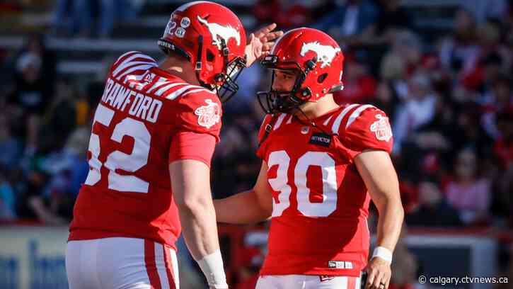 Mitchell throws over 300 yards for Stampeders in 30-23 win over Elks