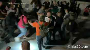 Cop who sought GOP state senate nomination allegedly punches Democratic candidate during Roe rally