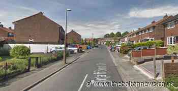 Little Hulton: Woman helped out of car after Trafford Drive crash