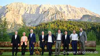Bekannt durch Foto mit Merkel und Obama: G7-Teilnehmer posieren vor Holzbank in Elmau
