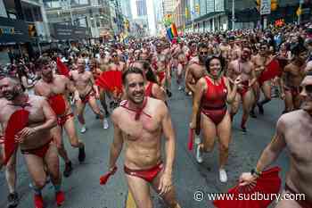 Tens of thousands throng downtown Toronto as Pride parade makes in-person return