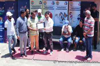 District Taekwondo championship kick starts in Bandipora - Rising Kashmir