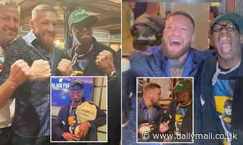 Arsenal legend Ian Wright chats with Conor McGregor parties with the UFC star at his Dublin pub