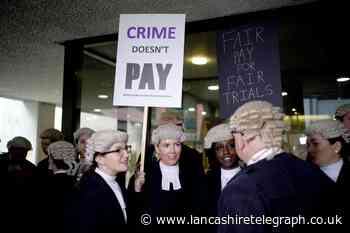 Barristers strike in action over pay and working conditions