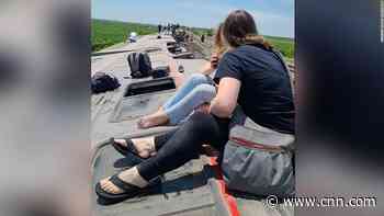 Multiple people killed when Amtrak passenger train derails in Missouri after hitting dump truck