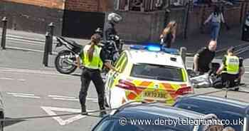 Heavy police presence after altercation on Derby street - Derbyshire Live