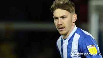 Matty Daly: Huddersfield Town loan midfielder to Harrogate Town