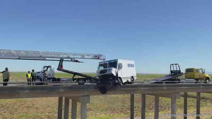 Brinks Driver Teeters Over Edge of I-5, Rescued From Brink of Disaster