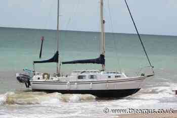 Yacht runs aground on Rustington beach in Littlehampton