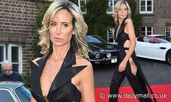 Lady Victoria Hervey catches the eye in revealing black tuxedo jumpsuit with cut out sides