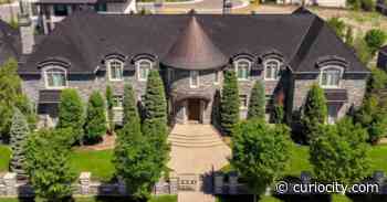This modern Alberta castle for sale has a sports lounge, elevator & more - Curiocity