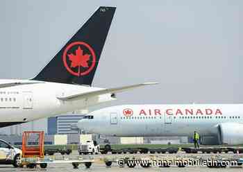 Air Canada to slash summer flight schedule as airports face lengthy delays