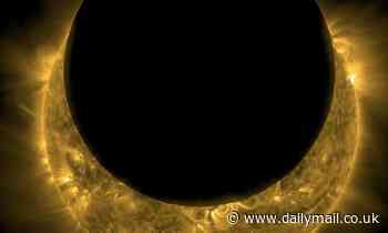 NASA probe snaps an image of a solar eclipse showing 'lunar mountains backlit by solar fire'