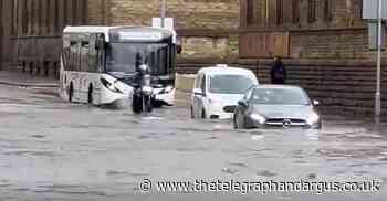 Heavy rainstorm causes flooding and cracked roads in Shipley