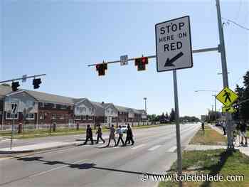 New crosswalk, signals celebrated at southwest Toledo spot where teenager died