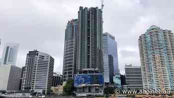 'It's just a nightmare': Buyers dismayed at further delays to Brisbane riverside, luxury apartments
