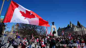 The Canadian flag in the context of 'Freedom Convoy' and residential schools