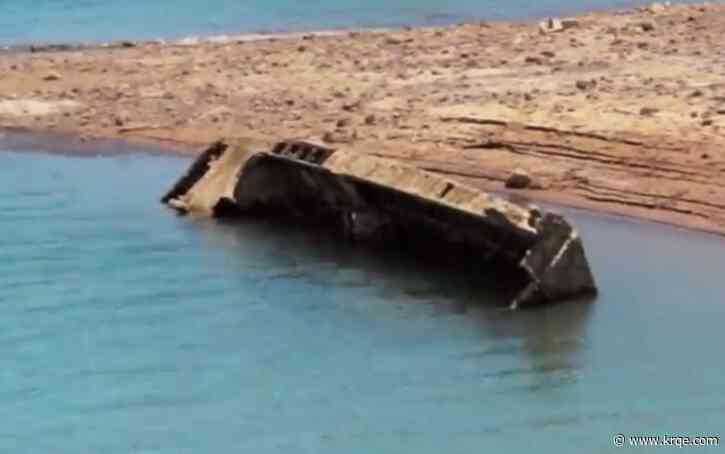 WWII-era landing craft emerging from Lake Mead