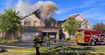 Man in critical condition from Aurora townhouse fire