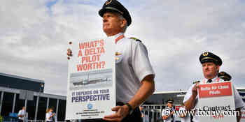 Delta pilots picket ahead of the busy Fourth of July travel weekend