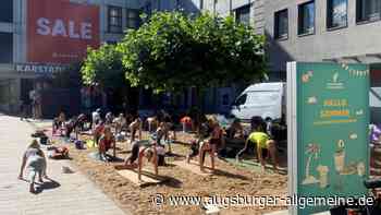Yoga am Martin-Luther-Platz: Sportlich geht es in Augsburg in den Tag