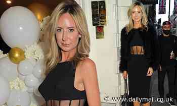Lady Victoria Hervey flashes her toned waist in a skin-tight midi dress with sheer panels