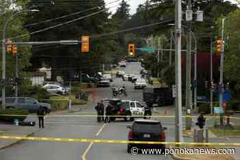 Woman held hostage during B.C. bank shooting experiencing roller-coaster of emotions