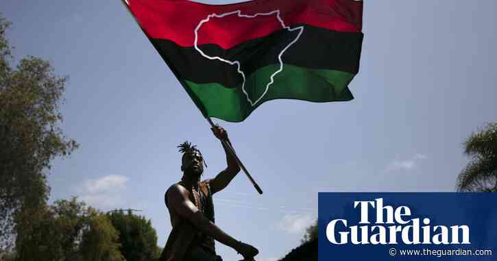 Person with flamethrower sets fire to Pan-African flag at activist headquarters