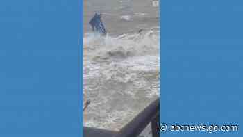 WATCH:  Rescuers lift sailors from sinking ship in South China Sea