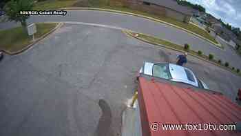 Security video shows suspect Austin Hall stealing a delivery driver’s car before Bibb County shootout - Fox 10 News