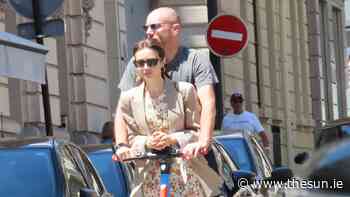 Emily in Paris star Lily Collins rides e-scooter with husband Charlie McDowell around the French capital... - The Irish Sun
